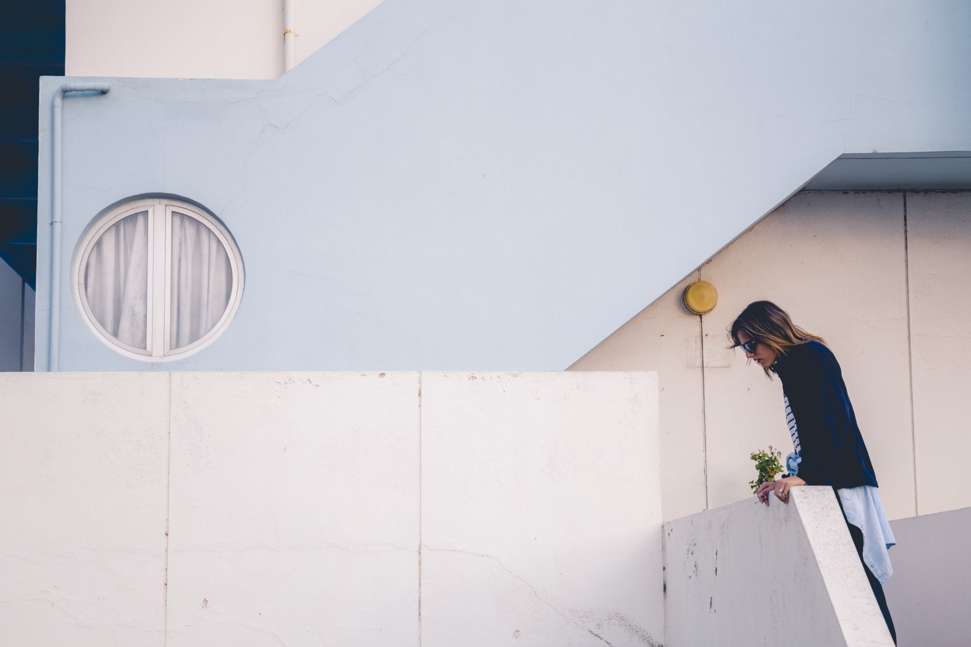 Woman looking down.